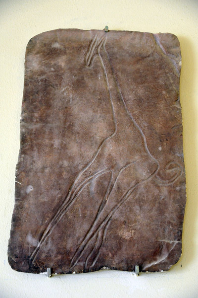 Prehistoric stone carving of a giraffe, Jebel Acacus