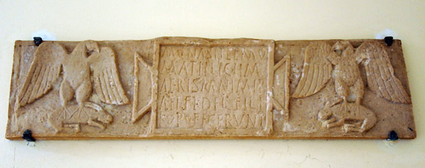Relief carving with inscription