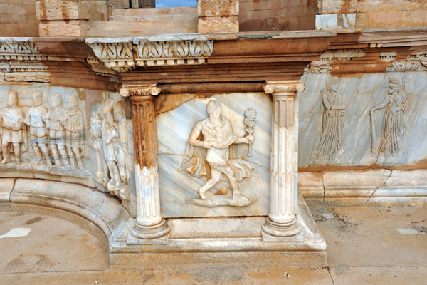 Relief of Mercury between the center and right recessed reliefs
