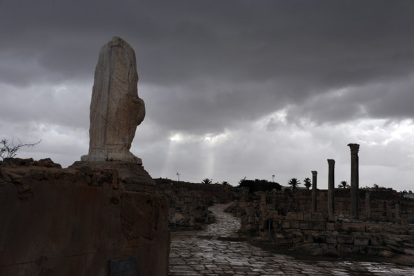 Statue and original Roman roads, Sabratha