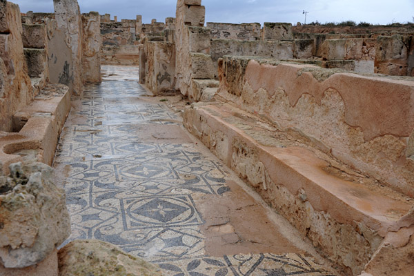 Stone bench and mosaic floor, Theater Baths, Sabratha
