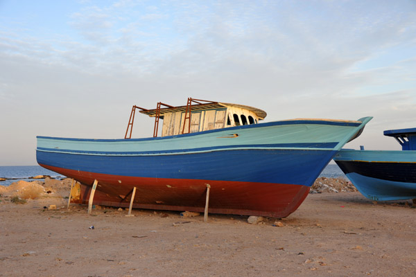 One of the larger boats at Al Khoms out of the water for maintenance