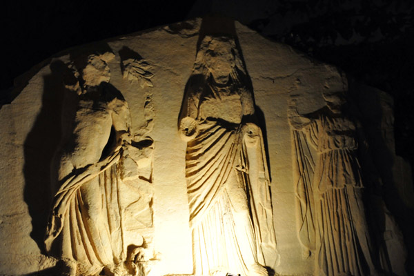 Roman relief sculpture in the park around the Arch of Marcus Aurelius