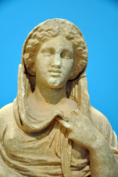 Persephone, wife of Hades, depicted with a face