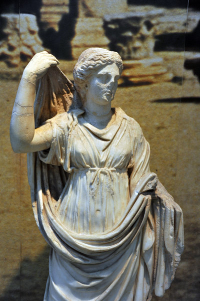 Venus (Aphrodite) raising her veil