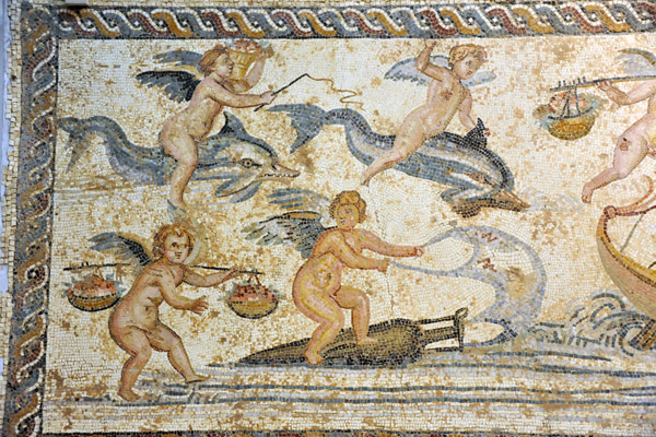 Mosaic with cupids riding dolphins and one using a cloth to sail and amphora