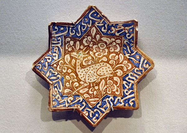 Star-shaped fritware tile with gazelle, Iran, 1200-1350