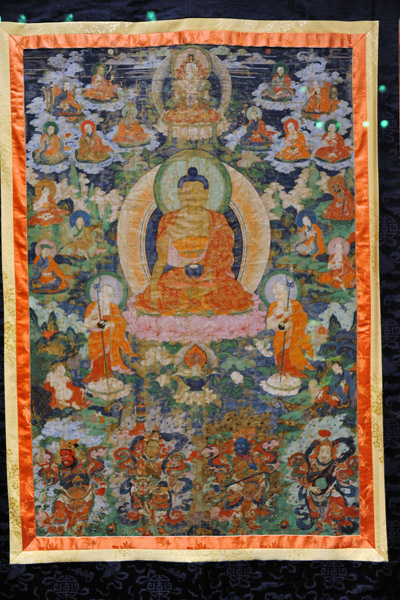 Seated Buddha with 16 arhats, 18th C. Tibet