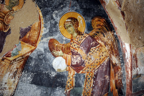 The Archangel at the thone's left hand