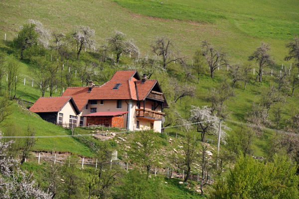 Farmhouse perched high on a hillside