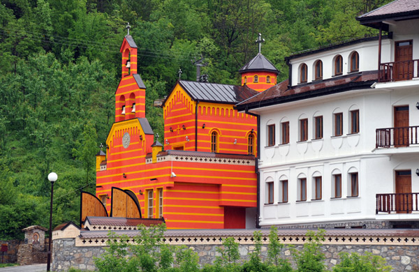 Dobrun Monastery with its bright red gatehouse