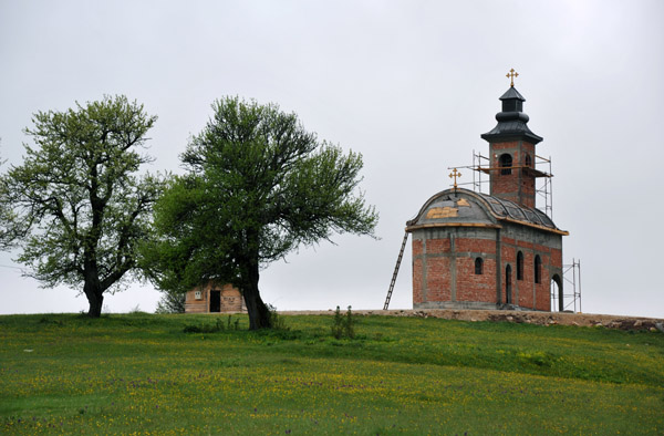 A new Serbian Orthodox church under construction in a rural area of Srpska