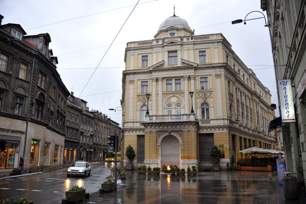 Former Landesbank (1893-95) at the west end of Ferhadija Street with the Eternal Flame