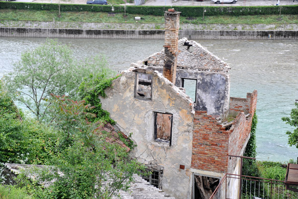 Bombed out house along the river, Konjic