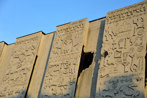 Decorative concrete façade with unrepaired war damage