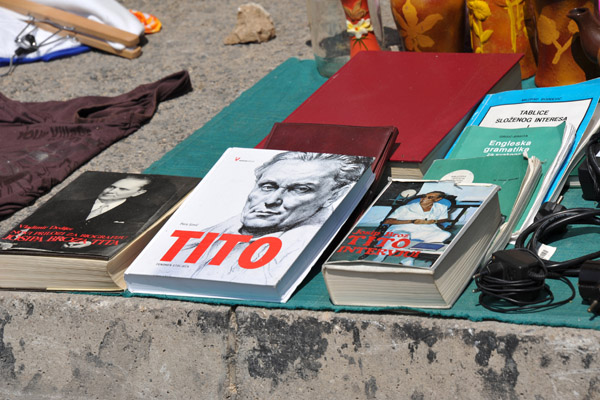 Sidewalk sale with books on Tito from the Yugoslavia era