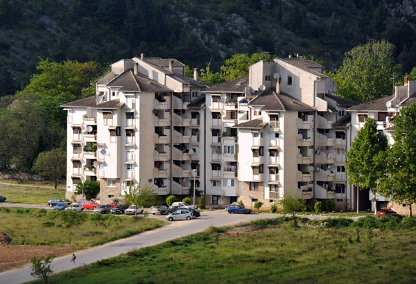 New-looking apartment blocks outside Stolac