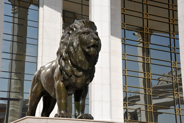 One of the lions in front of the National Library