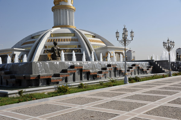 Plaza around the base of the Independence Monument with fountains and statues of the 27 heroes of Turkmenistan