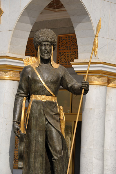 Statue of a sentry in traditional clothing of a Turkmen spearman