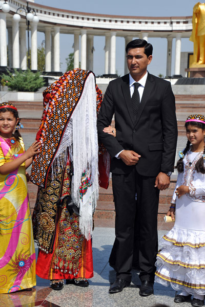 Amazing thickly veiled Turkmen bridal dress
