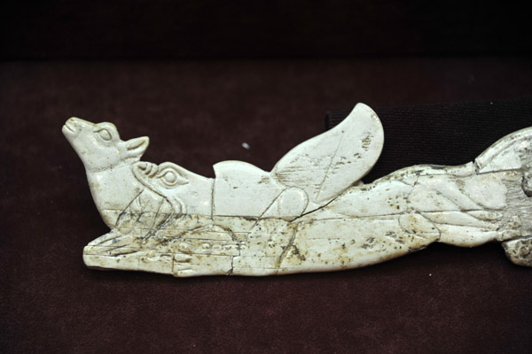 Ivory cosmetic space with depiction of snake eating deer, 3000-2000 BC