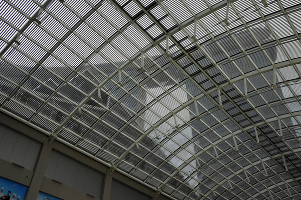 Looking through the glass roof of Shoppes at Marina Bay Sands at the Sky Park