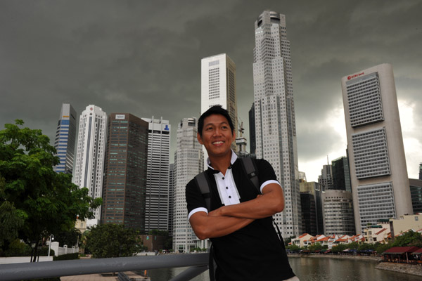 Dennis with the Singapore skyline