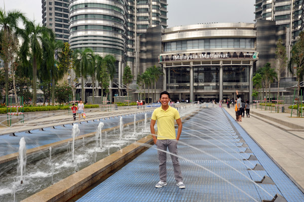 Dennis in the fountain in front of Petronas Towers