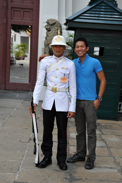 Dennis and a guard at the Grand Palace