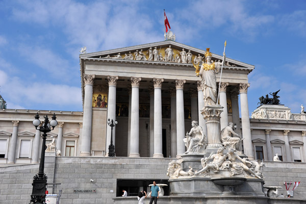 The Austrian Parliament building was constructed 1874-1883 in the Neo-Attic (Greek Revival) style by Theophil von Hansen
