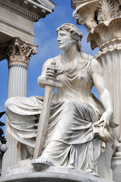 Sculpture at the base of the Athena Column sculpted by Josef Tautenhayn