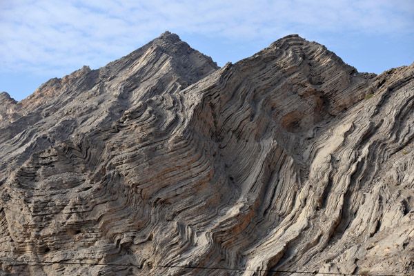 Folded layers of sedimentary rocks pushed upward