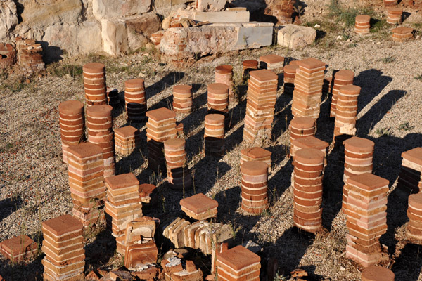 Pillars that once supported the heated floor of the baths of Kourion