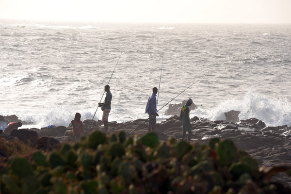 Locals fishing off the rocks, Cap-Verte