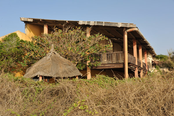 Building on the edge of the golf course overlooking the sea