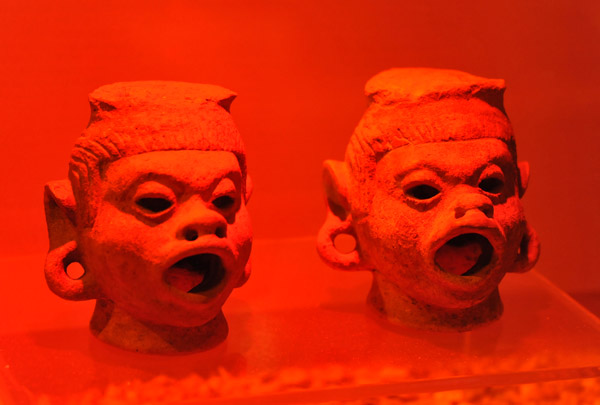 Heads representing the Pipil god Xipe Totec, associated with skin and eye diseases, 900-1200