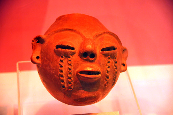 Head representing the Pipil god Xipe Totec, associated with skin and eye diseases, postclassic period