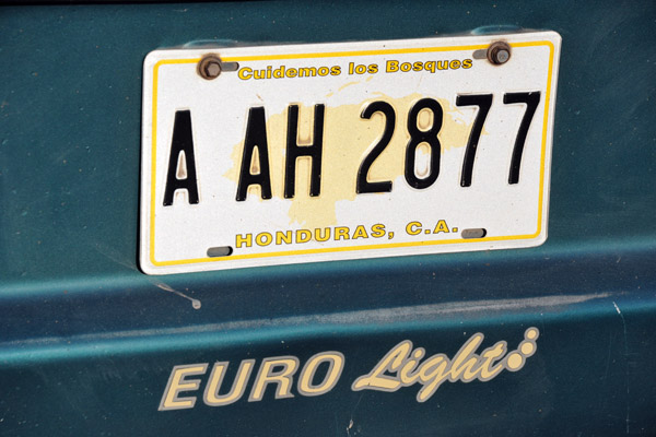 A yellow Honduran license plate