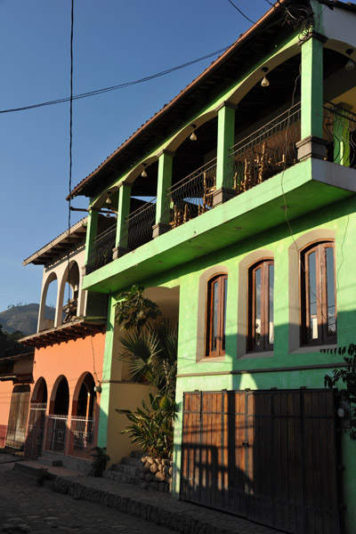 Airy green balcony on an old house, Copan Ruinas