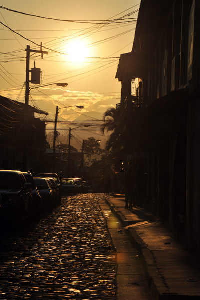 Sunset over a cobble stone street of Copan Ruinas