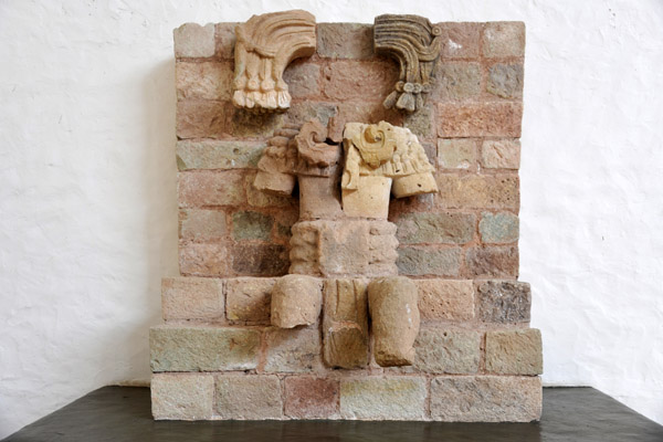 Bust from Temple 21 - human figure symbolically brought forth from the supernatural realm