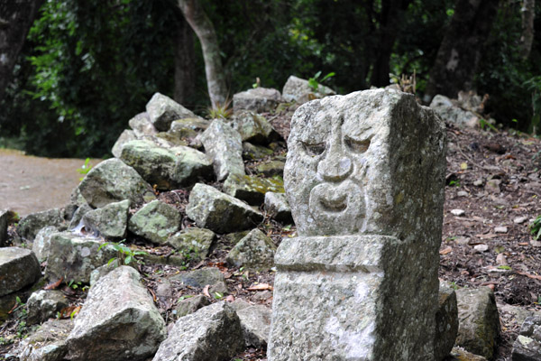 Carved figure, Acropolis of Copan