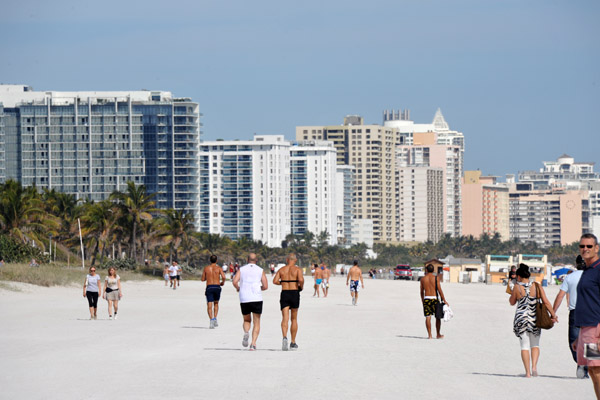 Joggers and walkers out on the beach - looking north, Miami Beach