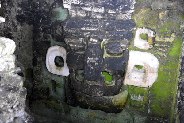 Mask uncovered from the faade of an earlier structure buried within the Northern Acropolis, Tikal