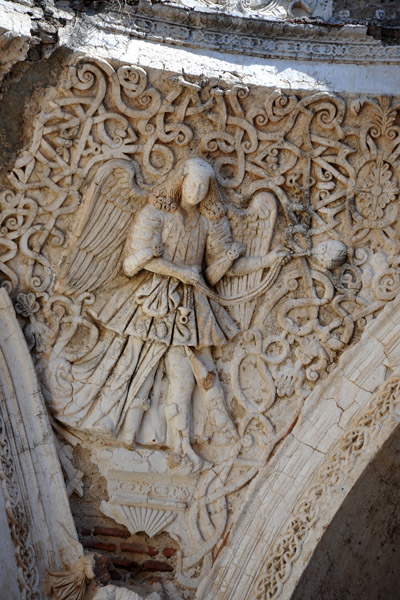 High relief of an angel waving incense 