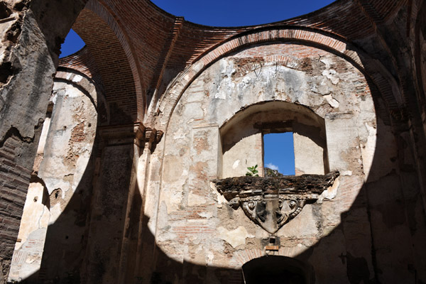 Circular pattern illuminated on a wall of the ruined cathedral