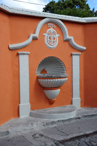 A fountain dated 1756, Calle de los Nazarenos