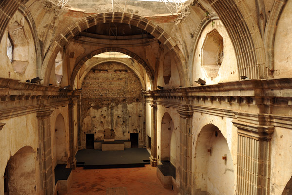 The church interior has not been restored, though a temporary roof protects it from the elements