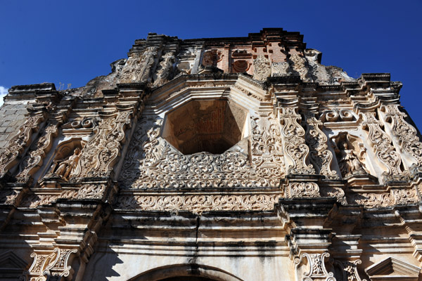 Intricately decorated southern faade with its large octagonal window, Antigua Guatemala